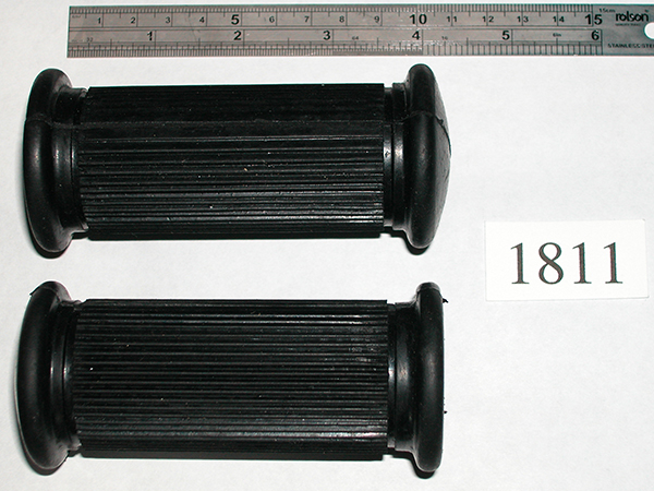 A pair of AMC/Norton rider's footrest rubbers, ½ inch diameter hole, no logo.
